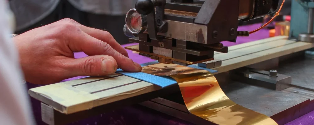 Hot stamping foil application on plastic components for logos and product decoration