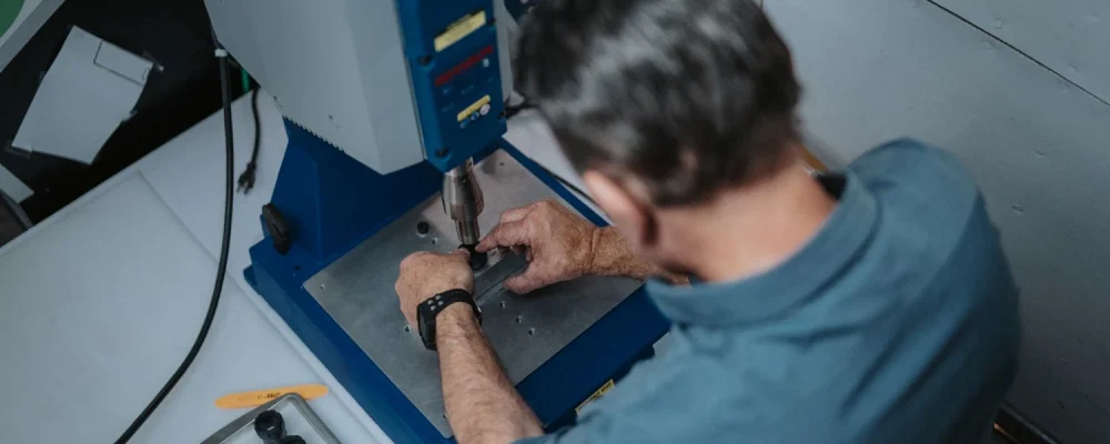 Ultrasonic insertion and ultrasonic welding process for assembling plastic parts